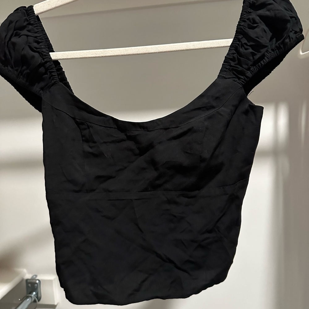 this top is a size 2 princess polly top with tags in great condition